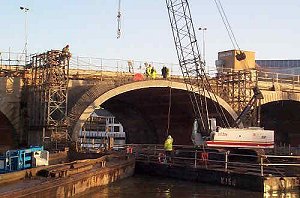 Installation of precast arch units