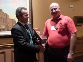 Terry Cakebread of LUSAS presents Duane M Green Jr.with his prize