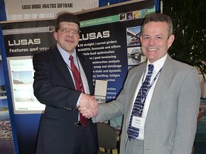 Tom Pechillo of Collins Engineers in Rocky Hill, Connecticut is presented with the prize by Terry Cakebread of LUSAS