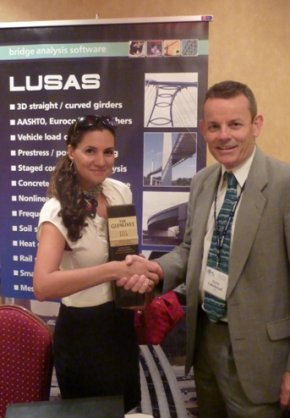 Melanie Soto-Medina of Greenman Pedersen Inc collects the prize on behalf of her colleaguen Paul Yuan.